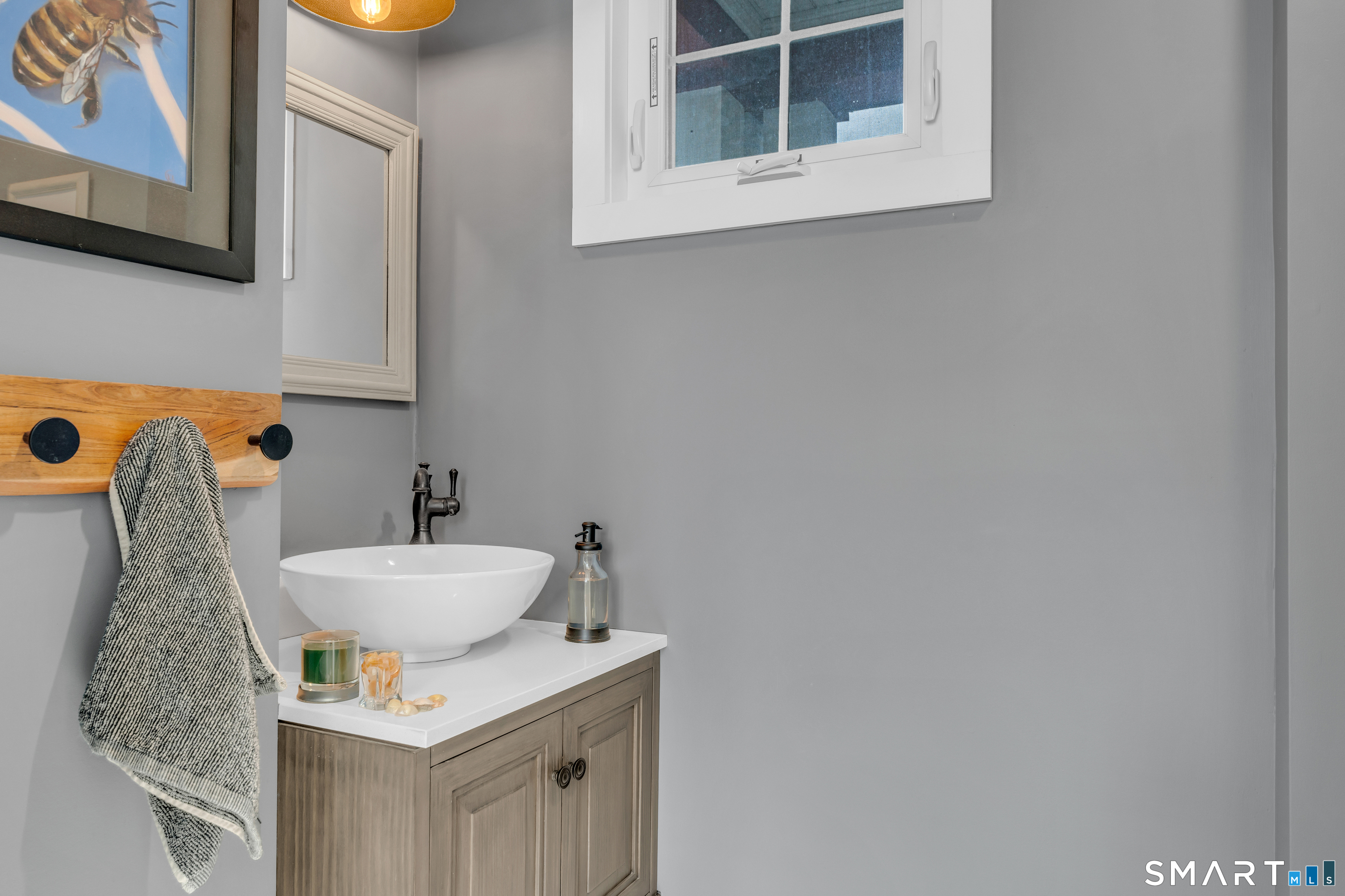 575 Ocean Avenue New London, CT 06320 - Photo 19 of 40 a bathroom with a sink and a mirror