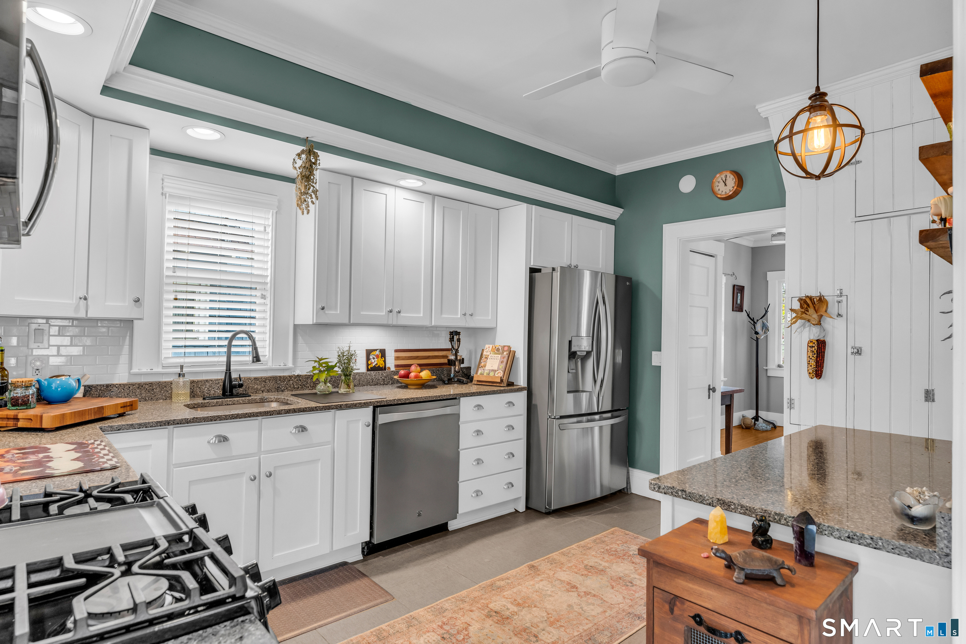 575 Ocean Avenue New London, CT 06320 - Photo 22 of 40 a kitchen that has a lot of cabinets a stove and a refrigerator