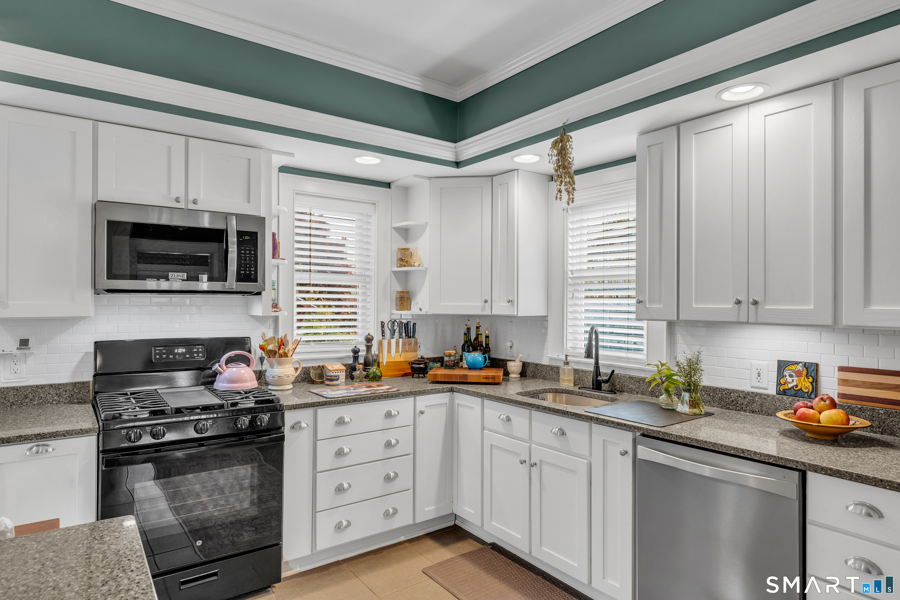 575 Ocean Avenue New London, CT 06320 - Photo 24 of 40 a kitchen with stainless steel appliances a sink stove and microwave