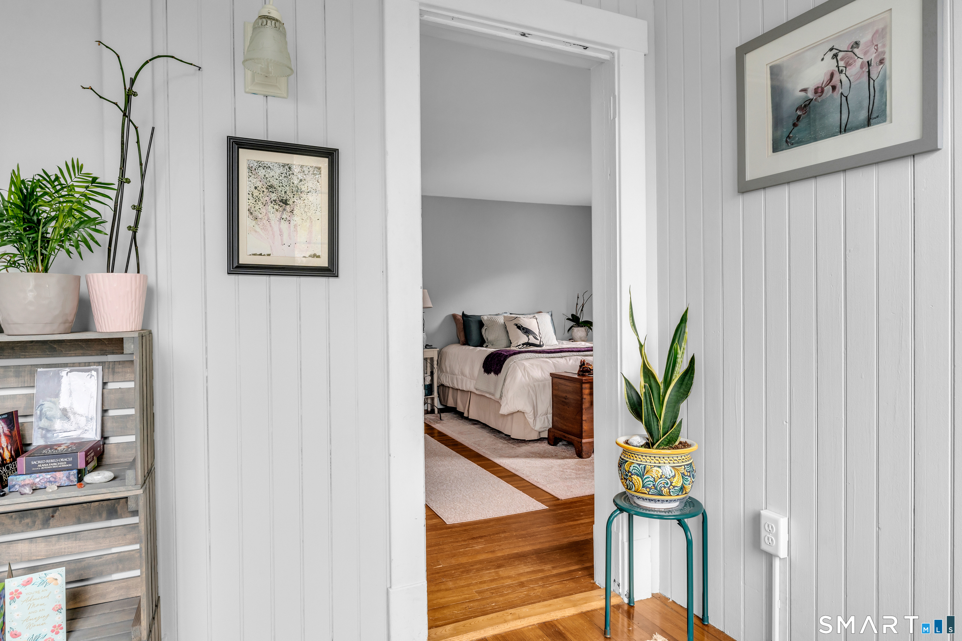 575 Ocean Avenue New London, CT 06320 - Photo 29 of 40 a bedroom with furniture and a potted plant