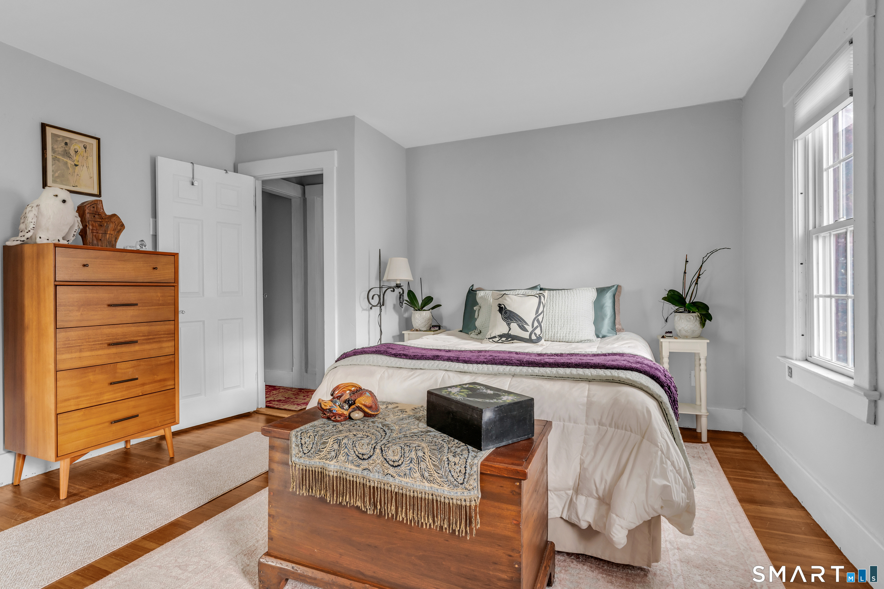 575 Ocean Avenue New London, CT 06320 - Photo 30 of 40 a bedroom with a bed and a dresser