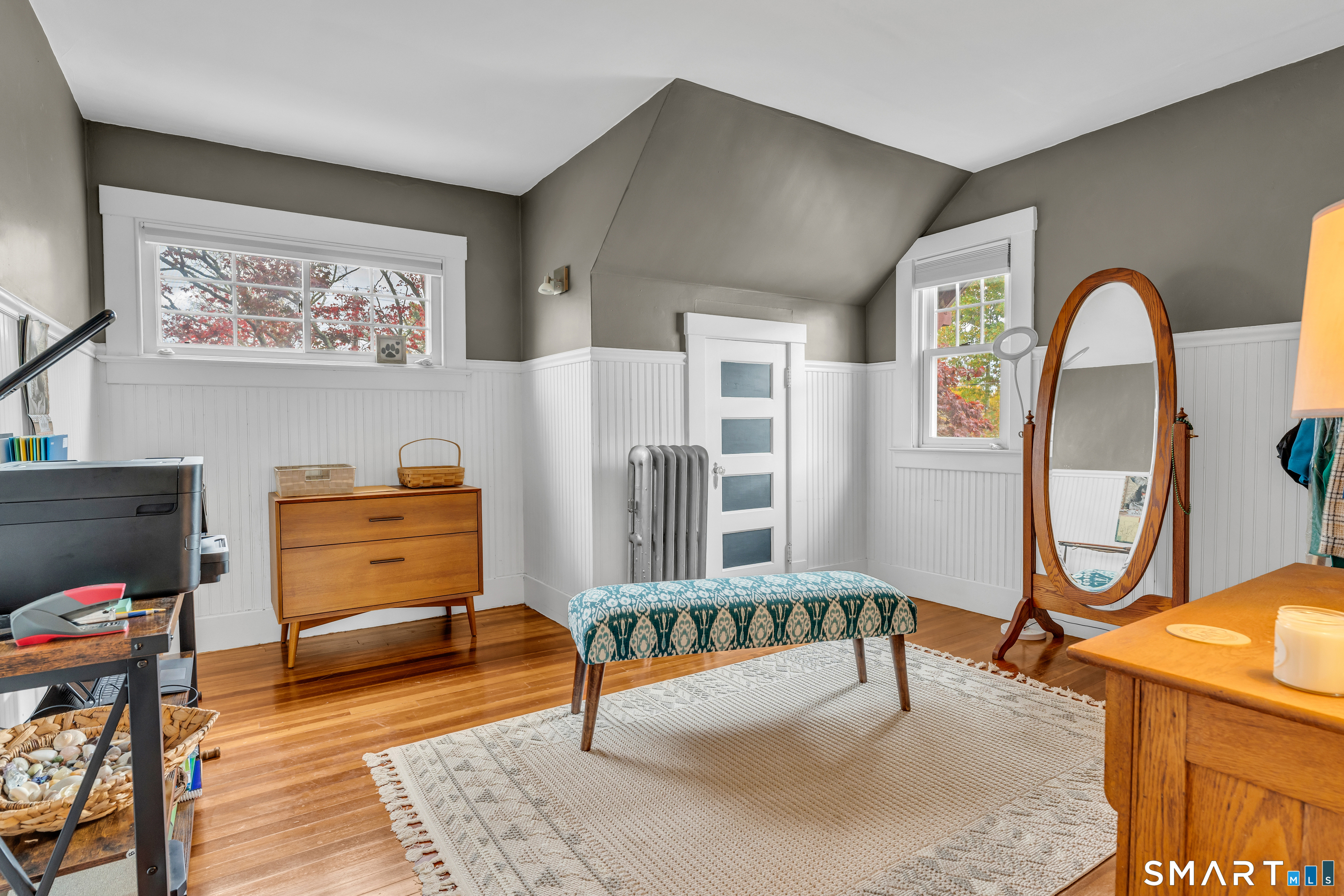 575 Ocean Avenue New London, CT 06320 - Photo 34 of 40 a room with lots of furniture and mirrors