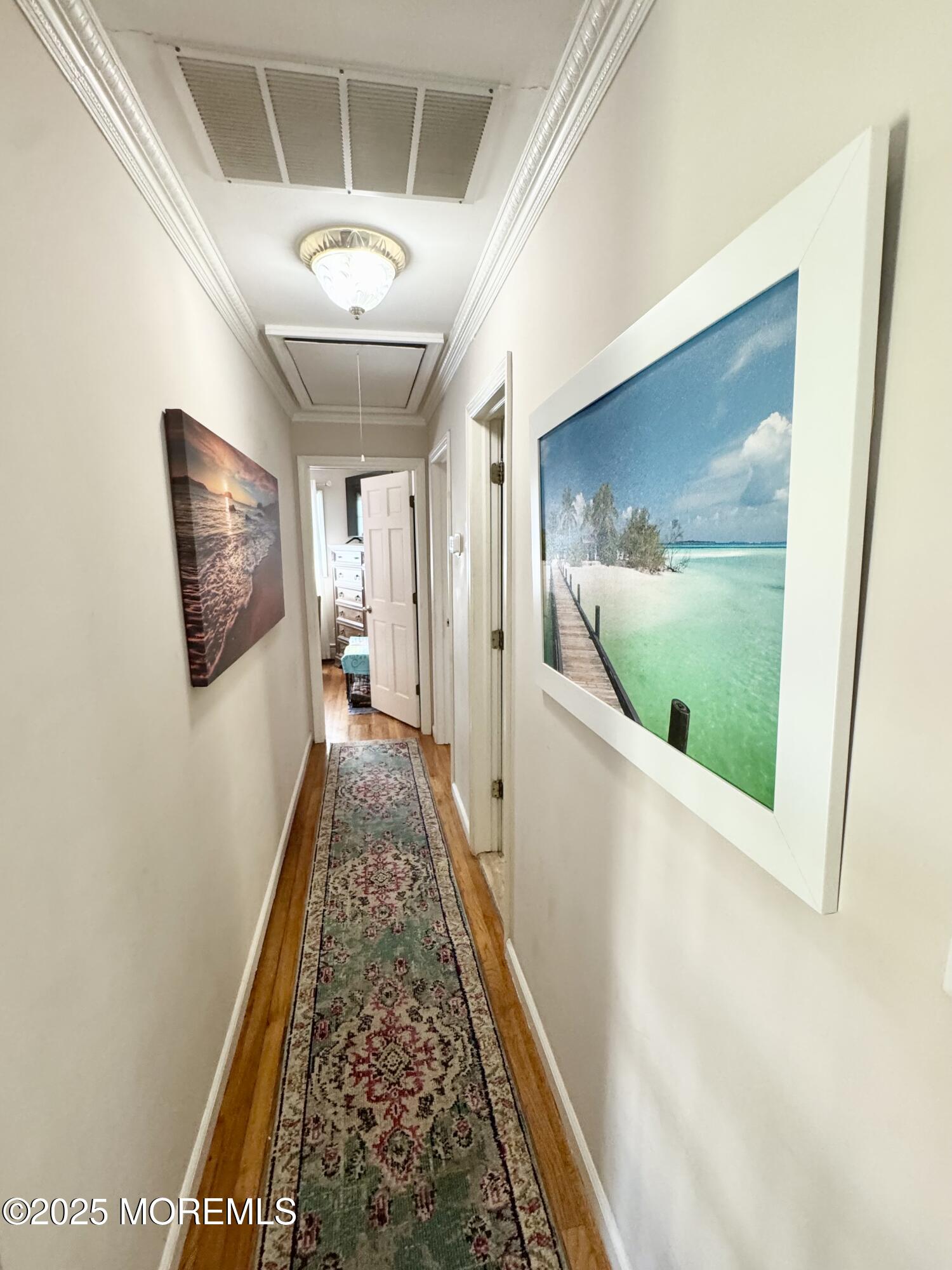 902 10th Street Union Beach, NJ 07735 - Photo 14 of 37 a view of hallway with stairs