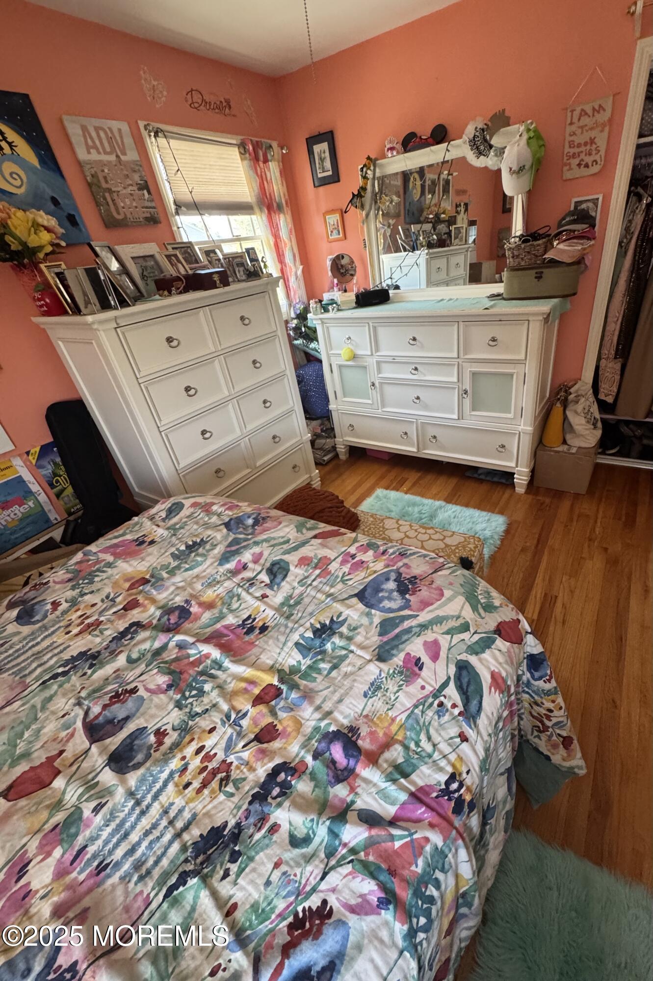 902 10th Street Union Beach, NJ 07735 - Photo 24 of 37 a bed with a white comforter and pillows