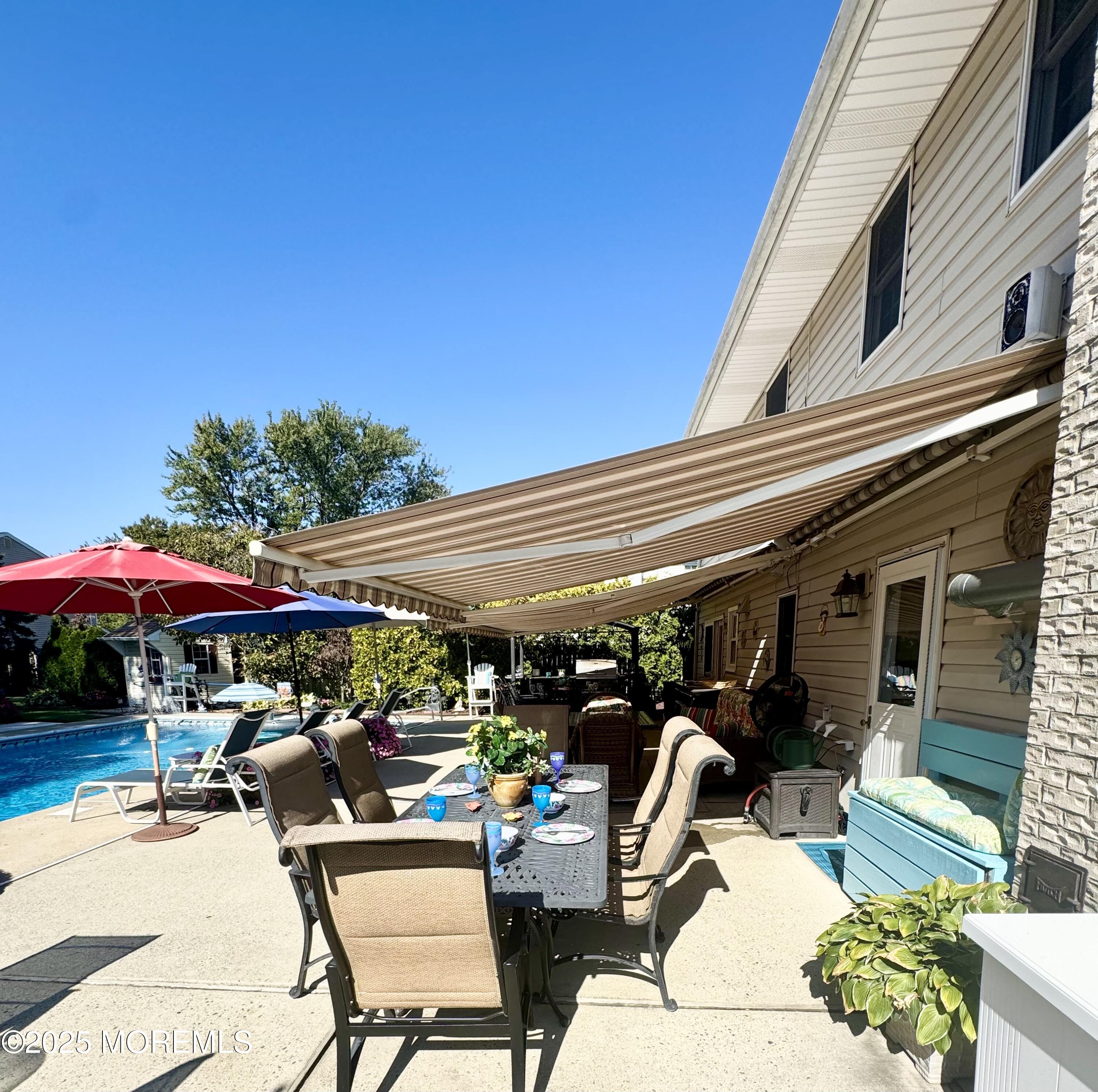 902 10th Street Union Beach, NJ 07735 - Photo 31 of 37 a group of people sitting outside of a building