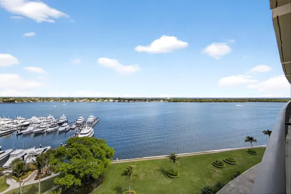 an aerial view of a house with a lake view