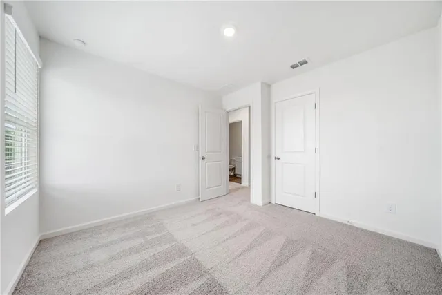 an empty room with a natural light