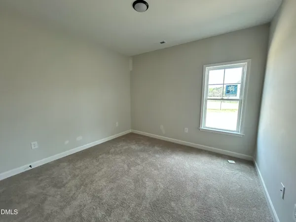 a view of empty room with window