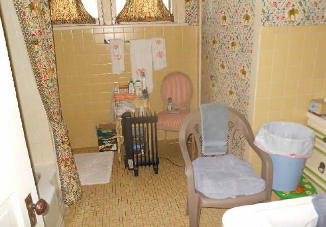 87 Locust Road Winnetka, IL 60093 - Photo 4 of 11 a bathroom with a sink and toilet