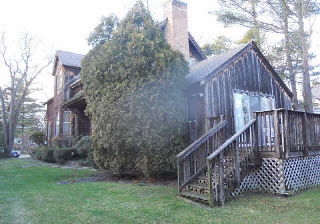 87 Locust Road Winnetka, IL 60093 - Photo 9 of 11 a view of a house with a yard with wooden fence