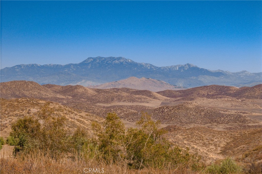 0 Hidden Valley Road Winchester, CA 92596 - Photo 4 of 5 a view of a town with mountains in the background