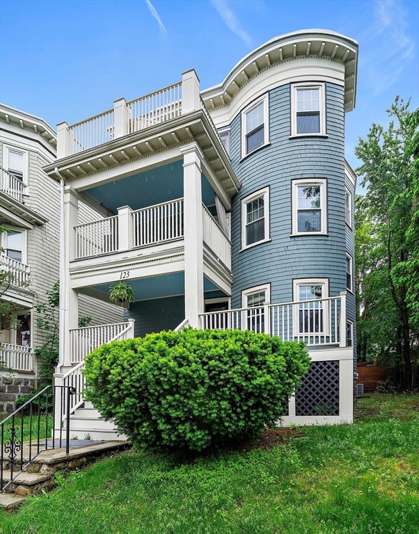 123 King Street, Unit 1 Boston, MA 02122 - Photo 24 of 24 a front view of a house with a yard