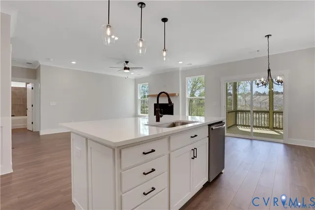 a view of a kitchen from the hallway