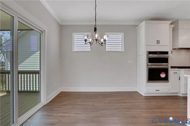 a bathroom with a sink a toilet and bathtub