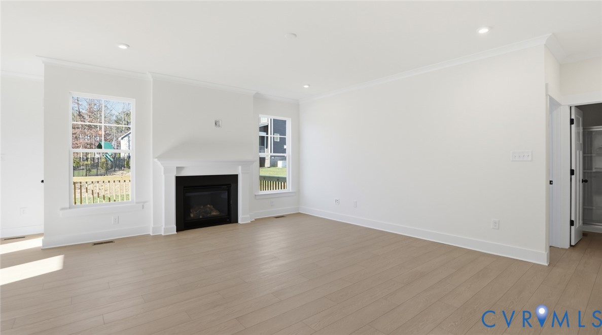 8900 Freebridge Road Chesterfield, VA 23832 - Photo 13 of 50 The cozy family room, featuring a gas fireplace,