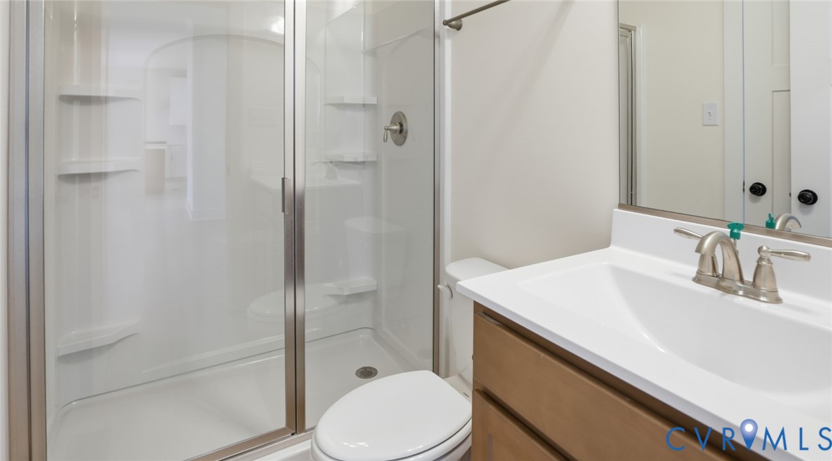 8900 Freebridge Road Chesterfield, VA 23832 - Photo 17 of 50 The first floor guest suite with ensuite bath.