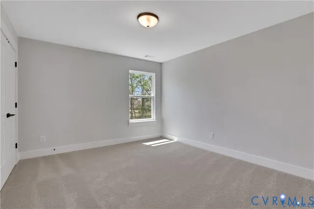 a view of a backyard with sitting area