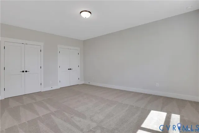 an aerial view of a house with swimming pool patio and mountain view