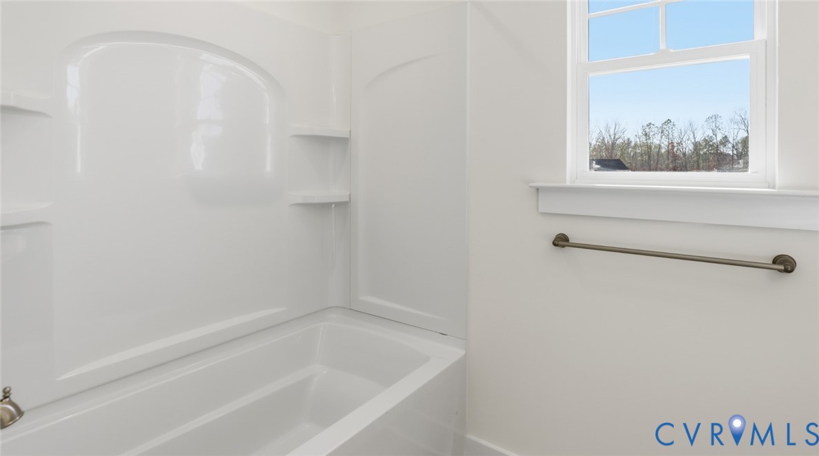 8900 Freebridge Road Chesterfield, VA 23832 - Photo 35 of 50 a close up of a bathtub in a bathroom