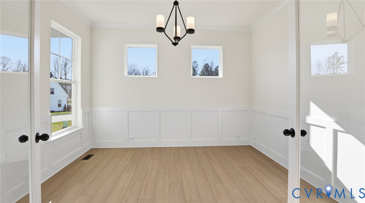 8900 Freebridge Road Chesterfield, VA 23832 - Photo 4 of 50 a view of an empty room with a window