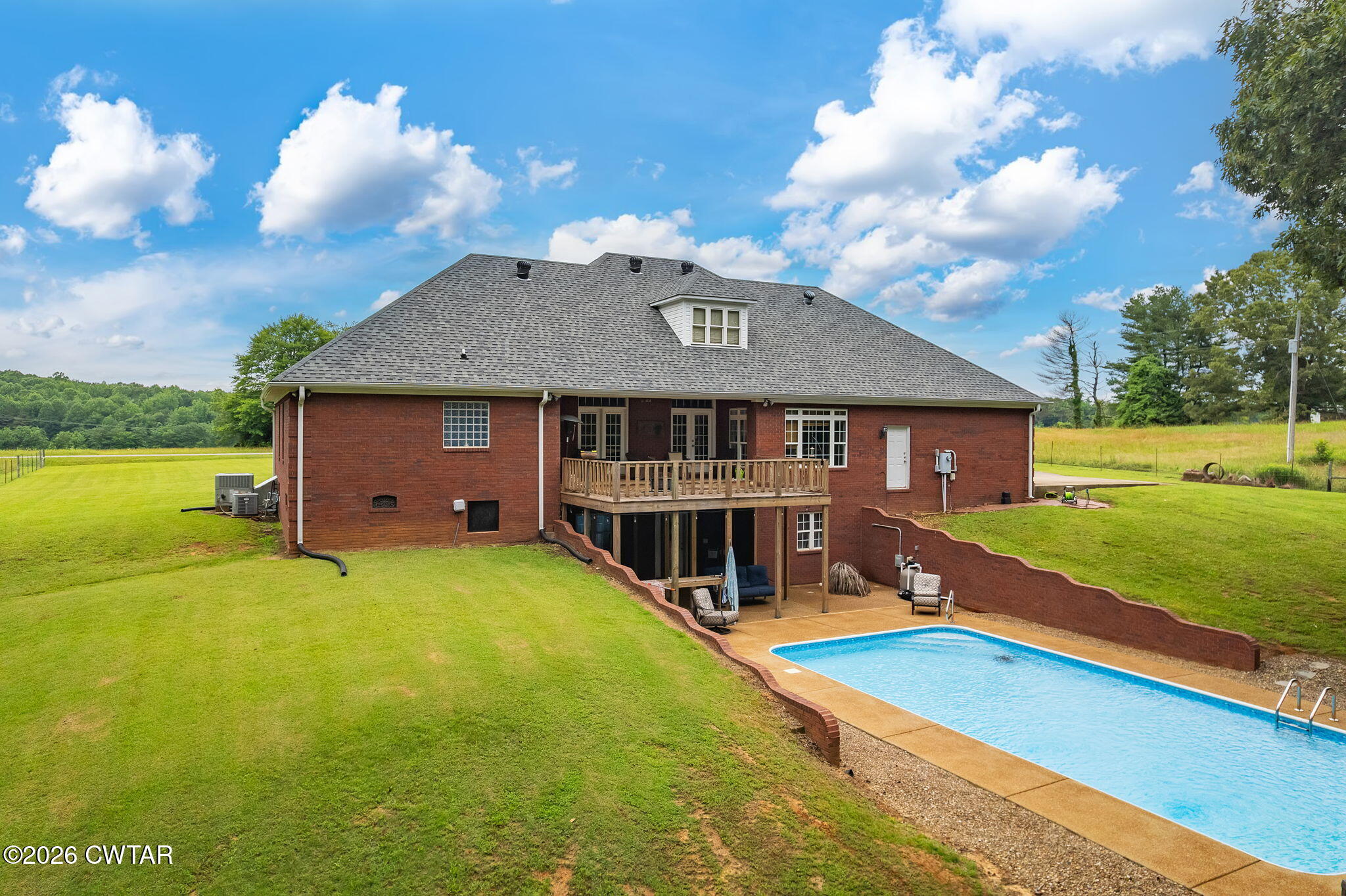 4320 Timberlake-Wildersville Road Lexington, TN 38351 - Photo 47 of 58 a view of a house with swimming pool and a yard
