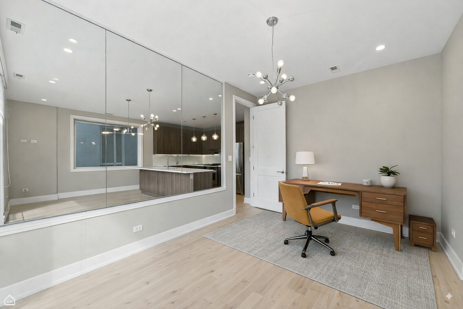 826 West Cullerton Street, Unit 2W Chicago, IL 60608 - Photo 13 of 23 a living room with furniture and a chandelier