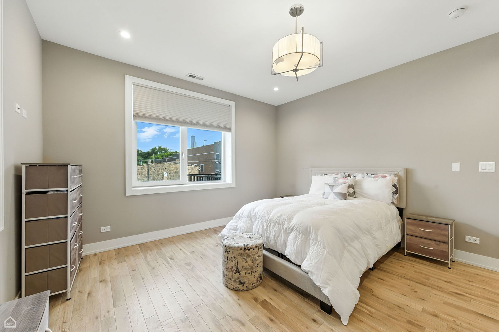 826 West Cullerton Street, Unit 2W Chicago, IL 60608 - Photo 15 of 23 a bedroom with a bed and a window