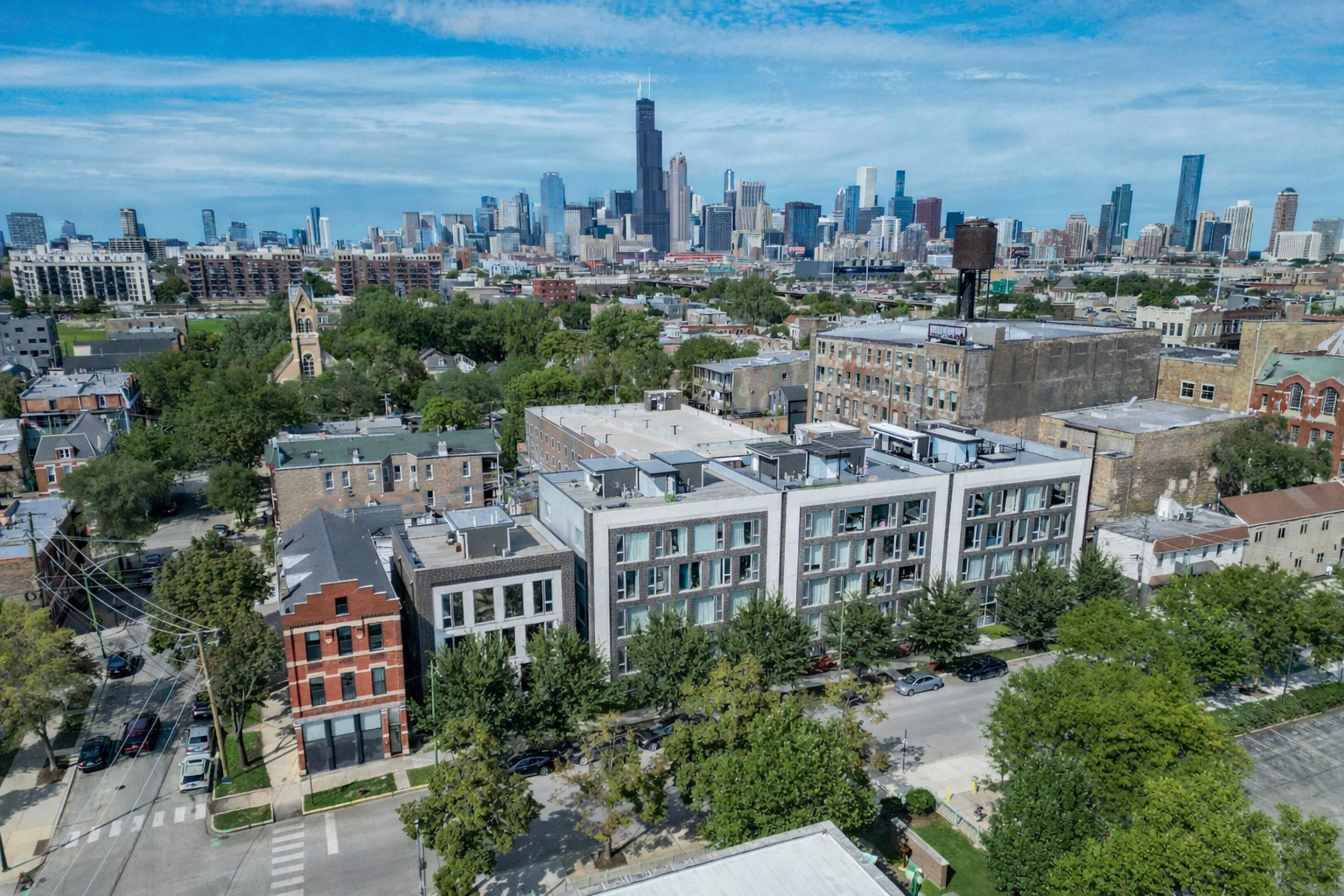 826 West Cullerton Street, Unit 2W Chicago, IL 60608 - Photo 3 of 23 a view of a city with tall buildings