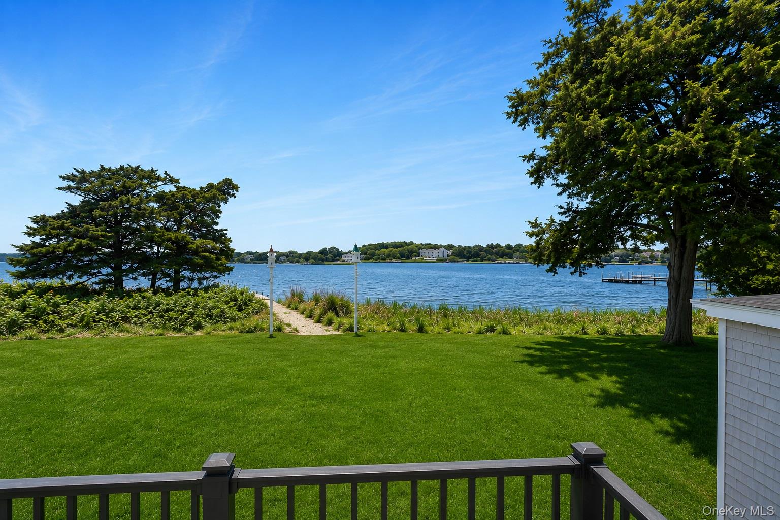 65 Shore Road Westhampton, NY 11977 - Photo 15 of 24 Expansive waterfront view from balcony with direct water access