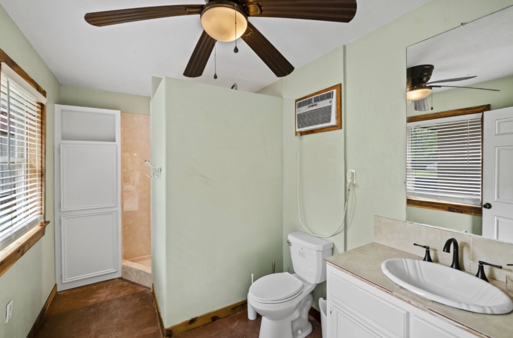 30338 Riley Road Waller, TX 77484 - Photo 37 of 46 a bathroom with a sink a toilet and shower