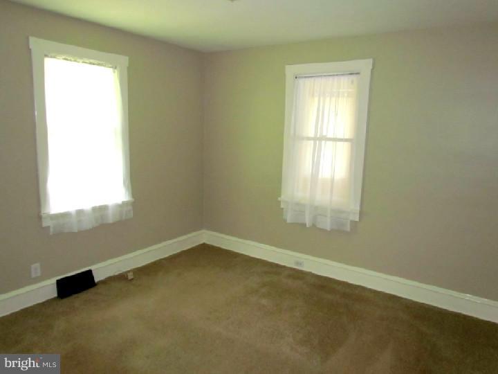 1755 Glassboro Road Sewell, NJ 08080 - Photo 12 of 28 an empty room with a window