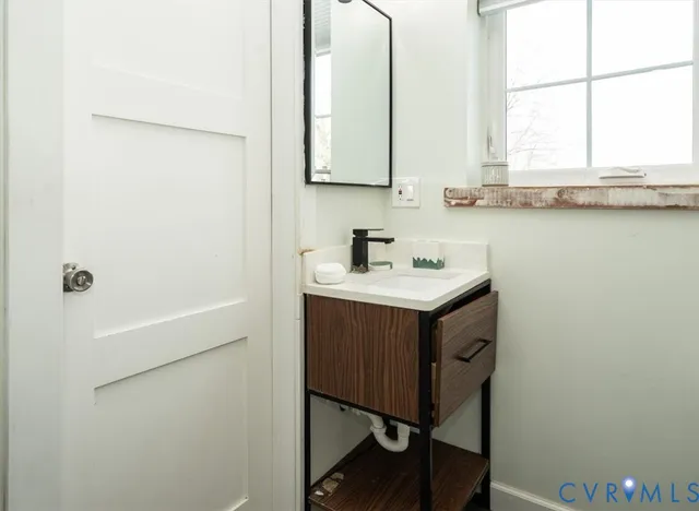 a bathroom with a toilet and shower