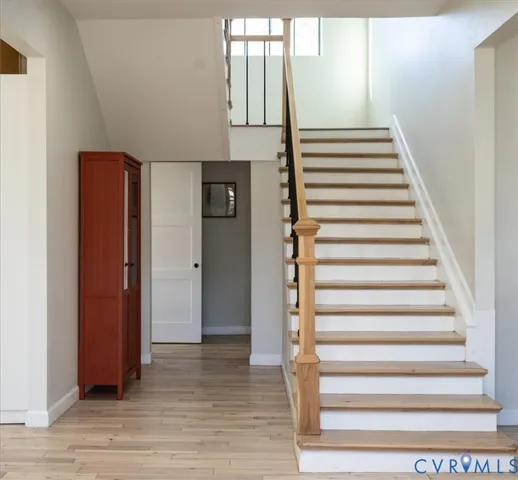a view of entryway with wooden floor