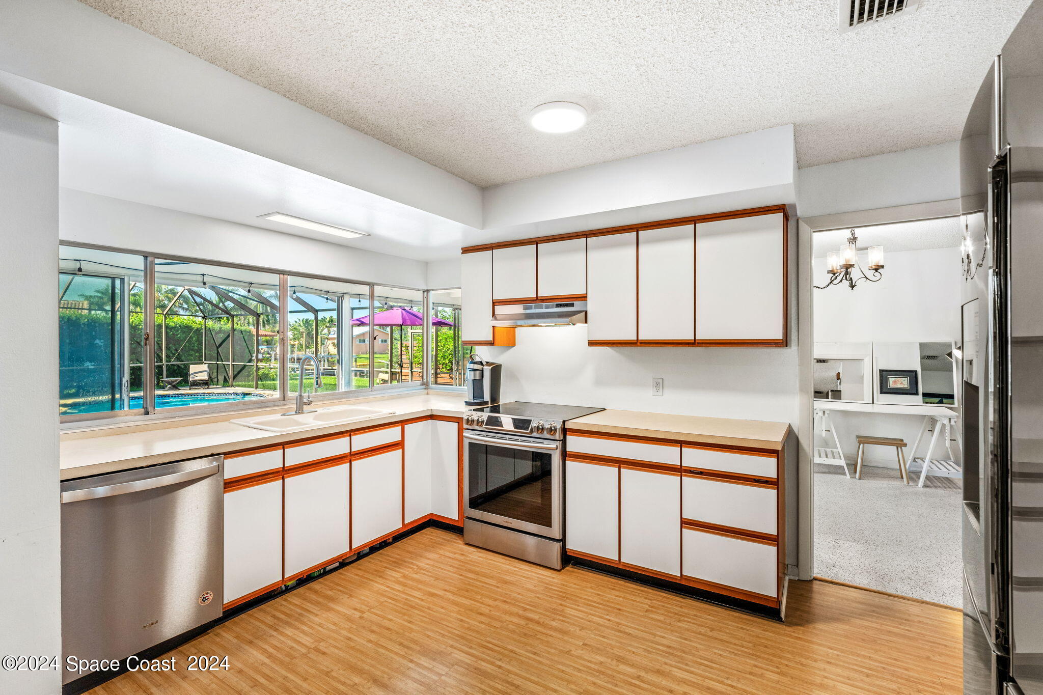 307 Brightwaters Drive Cocoa Beach, FL 32931 - Photo 11 of 45 Bright and open kitchen