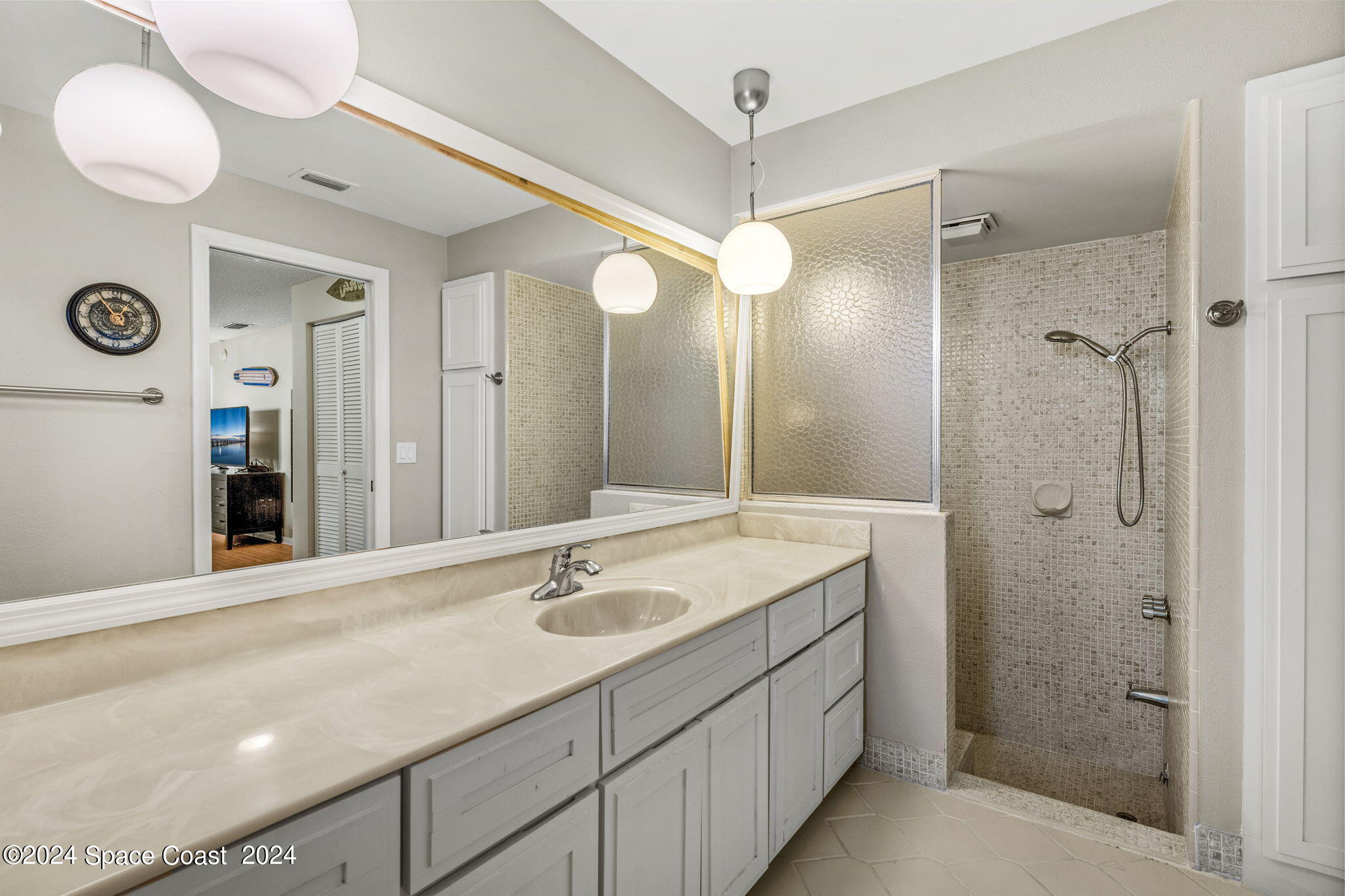 307 Brightwaters Drive Cocoa Beach, FL 32931 - Photo 20 of 45 Primary bath with shower/tub combo