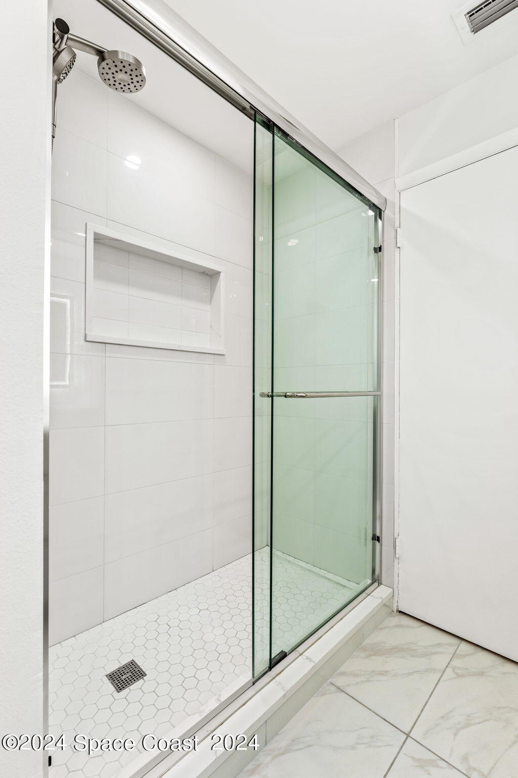 307 Brightwaters Drive Cocoa Beach, FL 32931 - Photo 26 of 45 Renovated guest bathroom shower