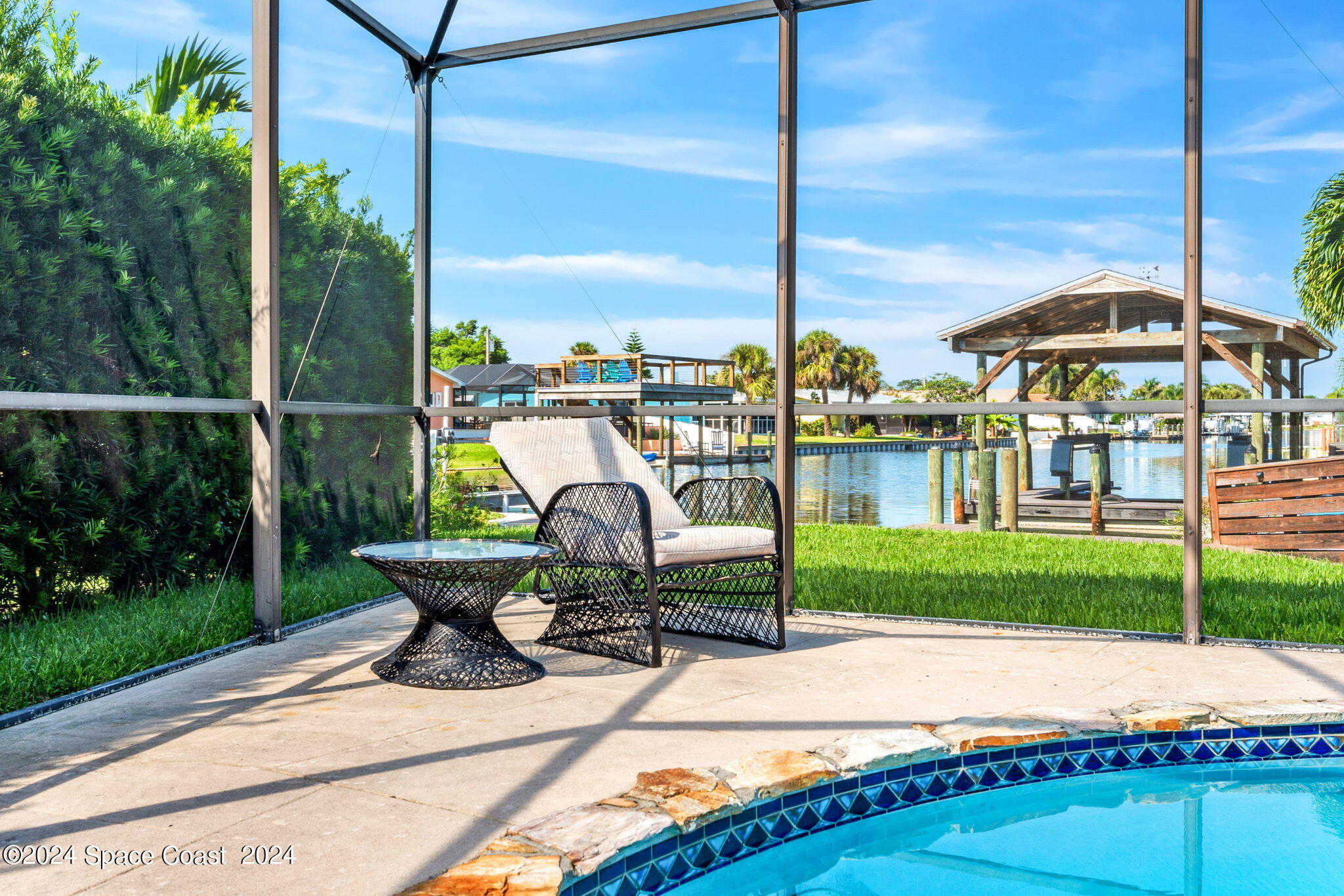 307 Brightwaters Drive Cocoa Beach, FL 32931 - Photo 34 of 45 Watch dolphin swim while you're swimming