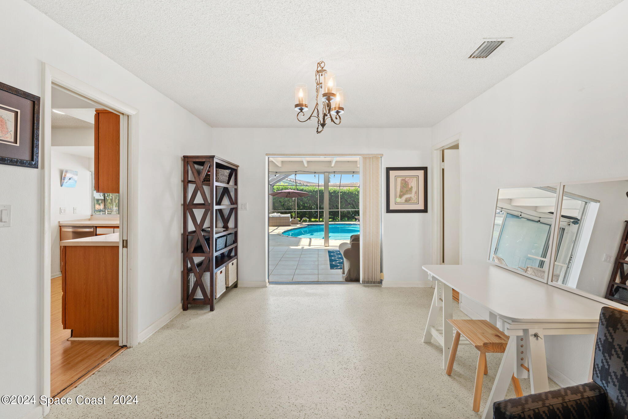 307 Brightwaters Drive Cocoa Beach, FL 32931 - Photo 9 of 45 Dining area w/ slider to pool