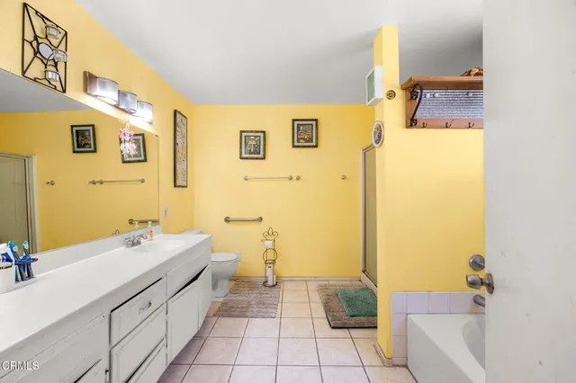 a bathroom with a shower and a tub