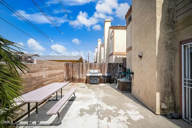 a backyard of a house with seating space