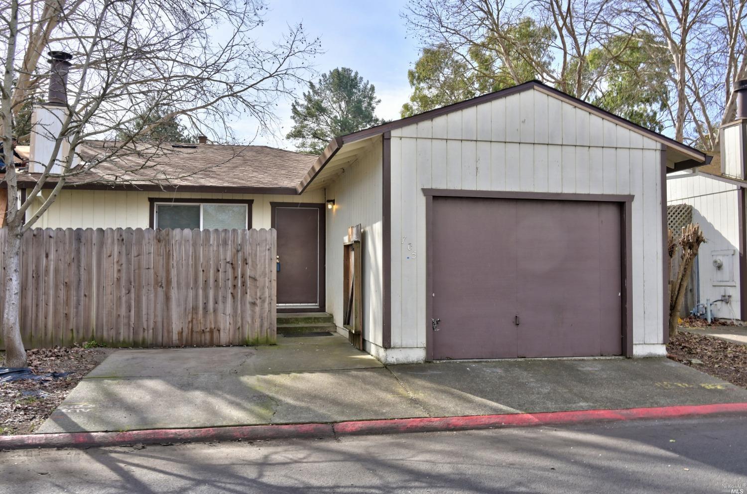 a house with trees in the background