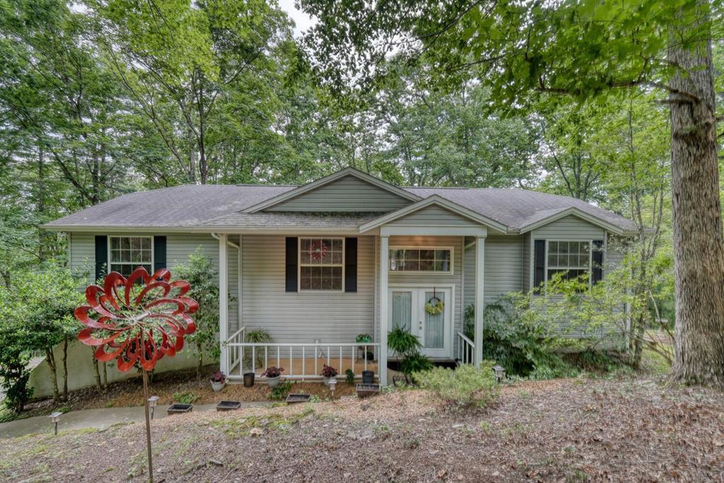 171 Mountain Top Road Blairsville, GA 30512 - Photo 1 of 54 a front view of a house with a porch