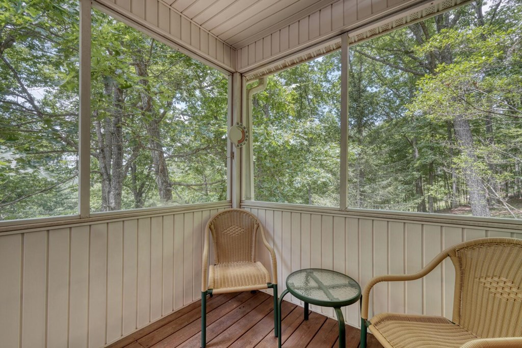 171 Mountain Top Road Blairsville, GA 30512 - Photo 14 of 54 a view of a two chairs in the balcony