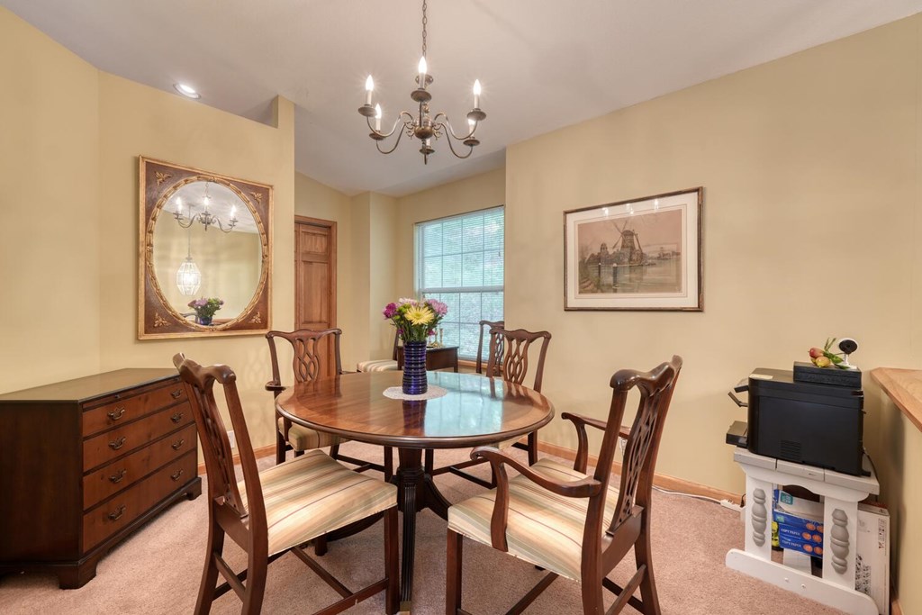 171 Mountain Top Road Blairsville, GA 30512 - Photo 25 of 54 a view of a dining room with furniture and chandelier