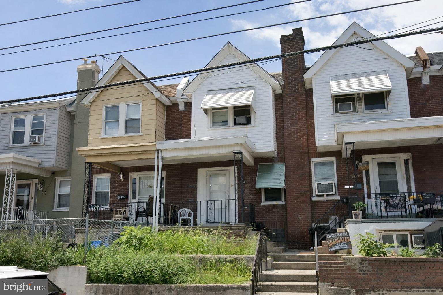 4727 Meridian Street Philadelphia, PA 19136 - Photo 4 of 8 a front view of a house with garden