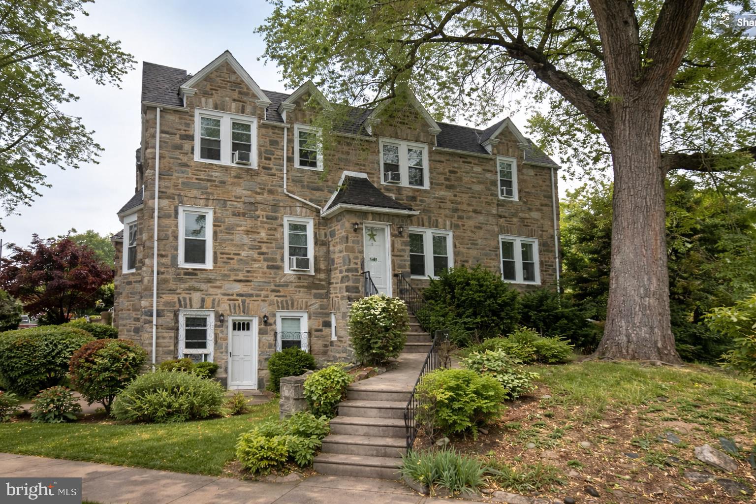 4727 Meridian Street Philadelphia, PA 19136 - Photo 7 of 8 a front view of a house with garden