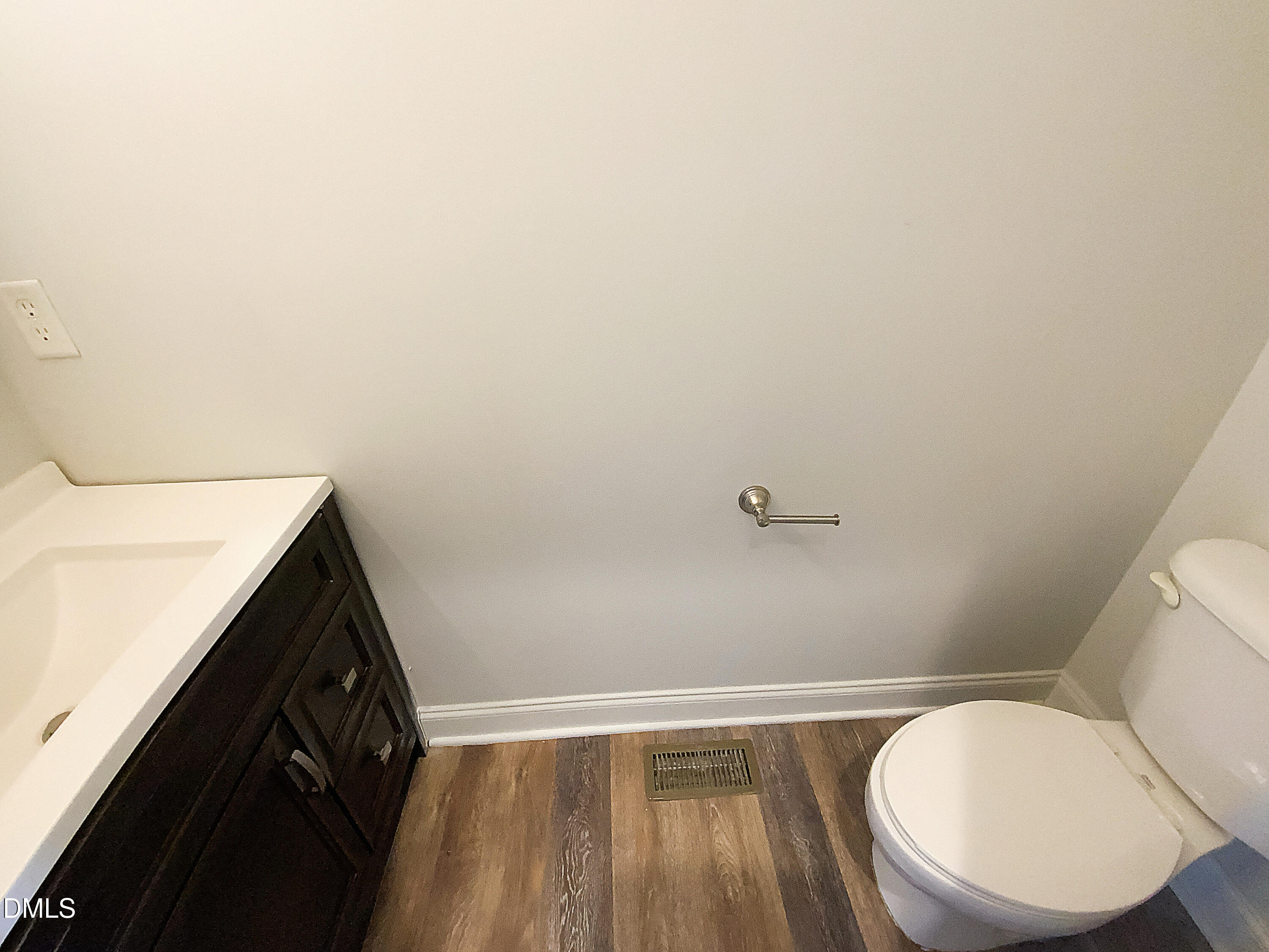 1217 Rolling Farm Drive Raleigh, NC 27603 - Photo 12 of 23 a bathroom with a toilet and a sink