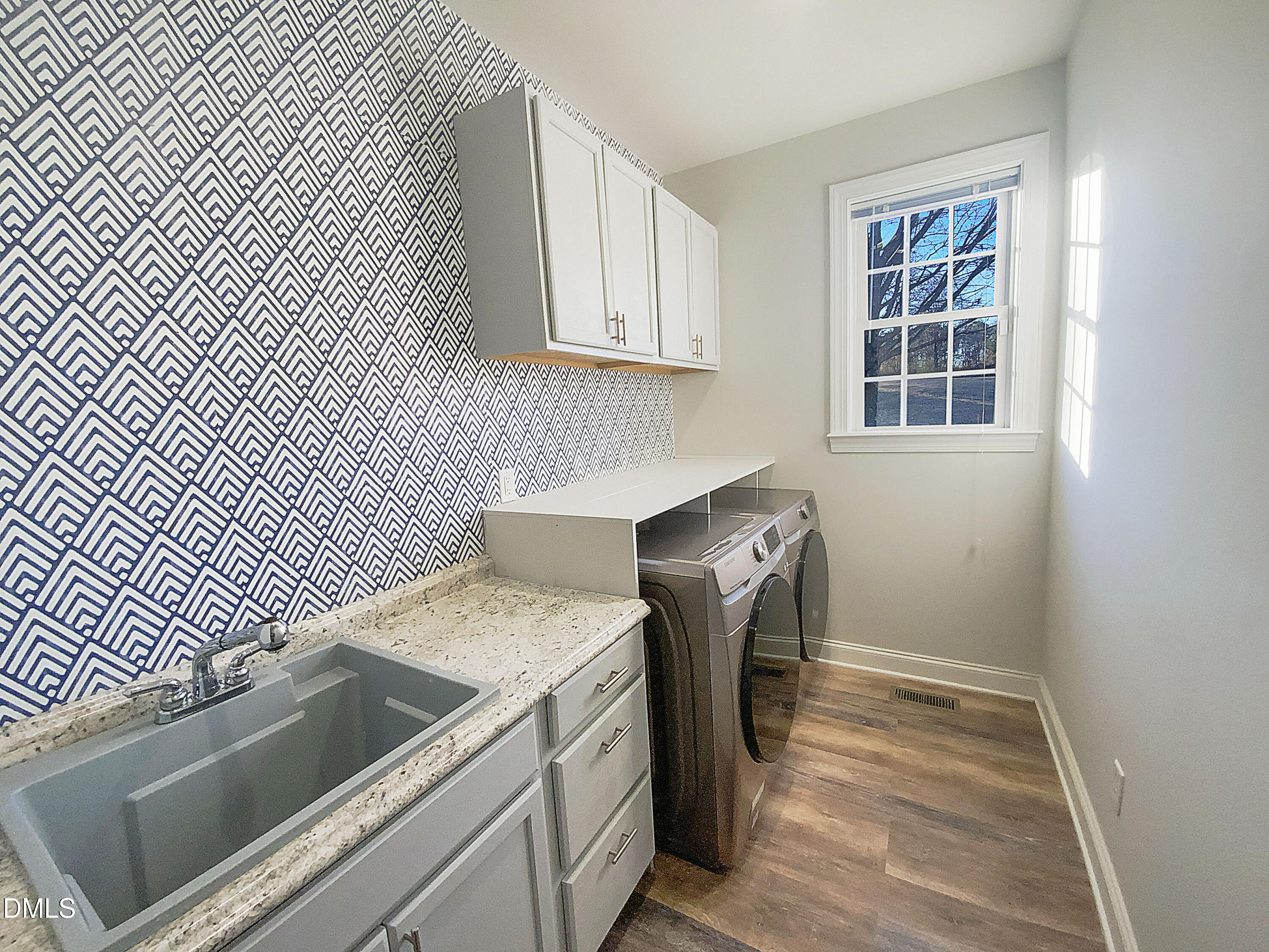 1217 Rolling Farm Drive Raleigh, NC 27603 - Photo 15 of 23 a utility room with dryer and washer