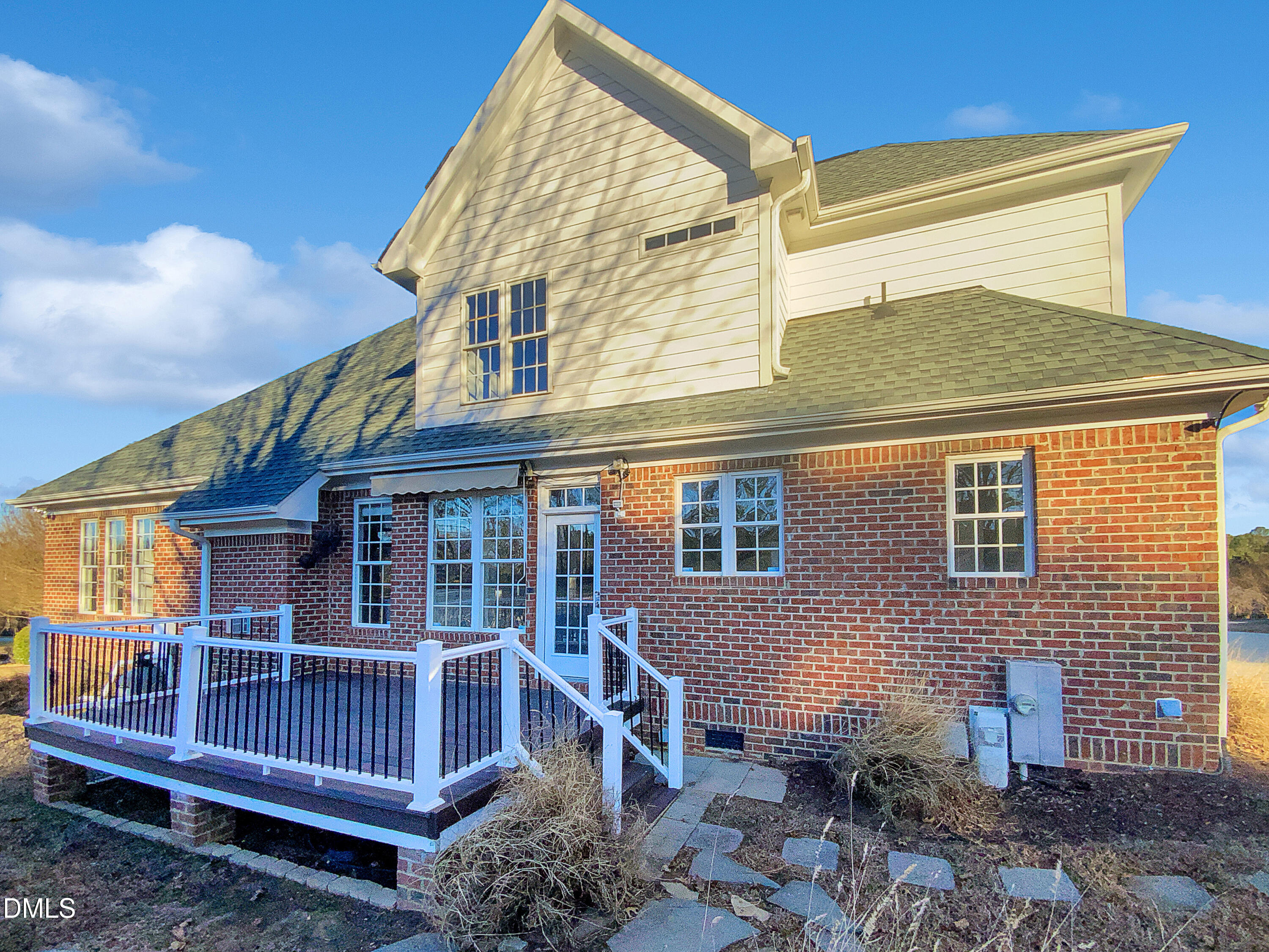 1217 Rolling Farm Drive Raleigh, NC 27603 - Photo 5 of 23 a view of house with a deck and furniture