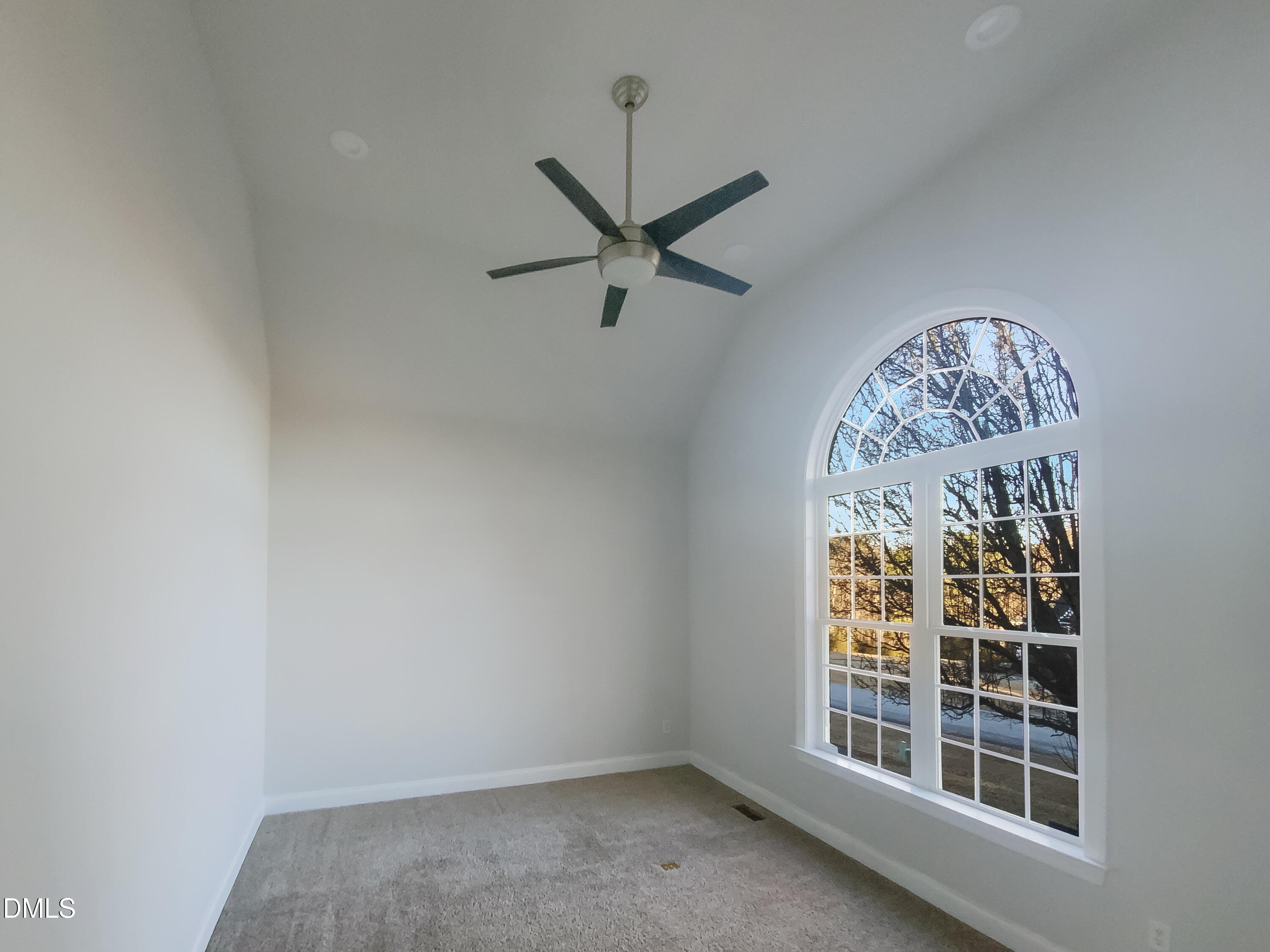 1217 Rolling Farm Drive Raleigh, NC 27603 - Photo 8 of 23 an empty room with a window